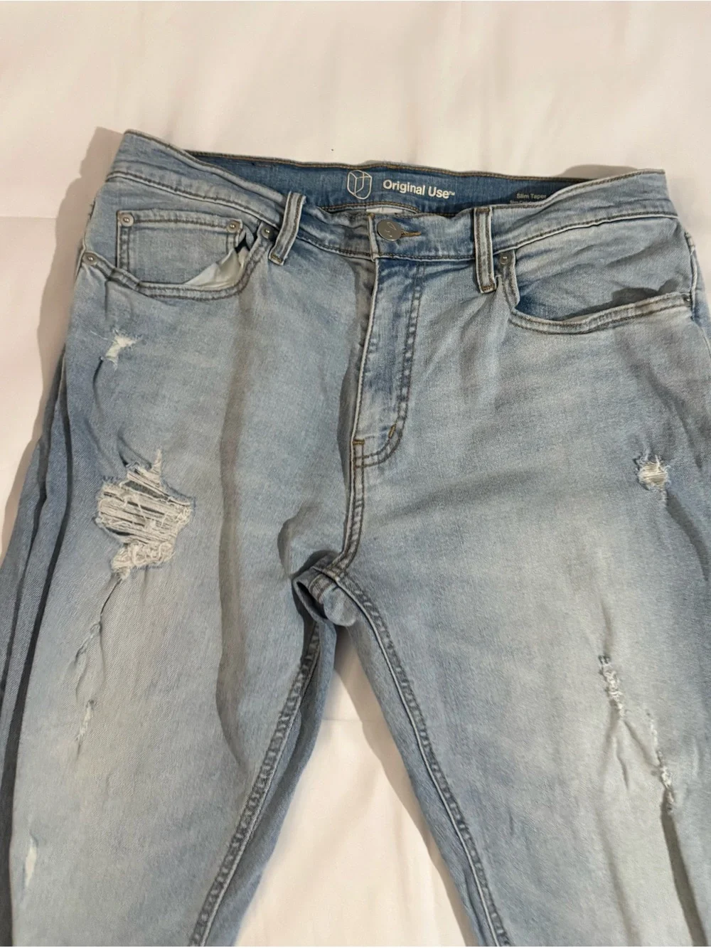 Original Use Slim Taper Distressed Light Wash Jeans